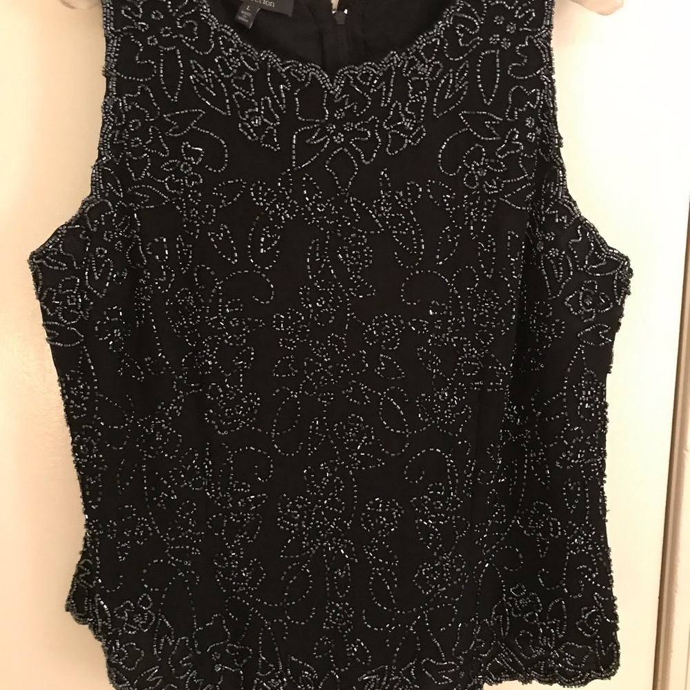 Beaded fitted black top.